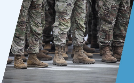 Legs of US Military members at presentation